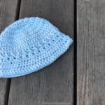 Blue baby sun hat laid flat.