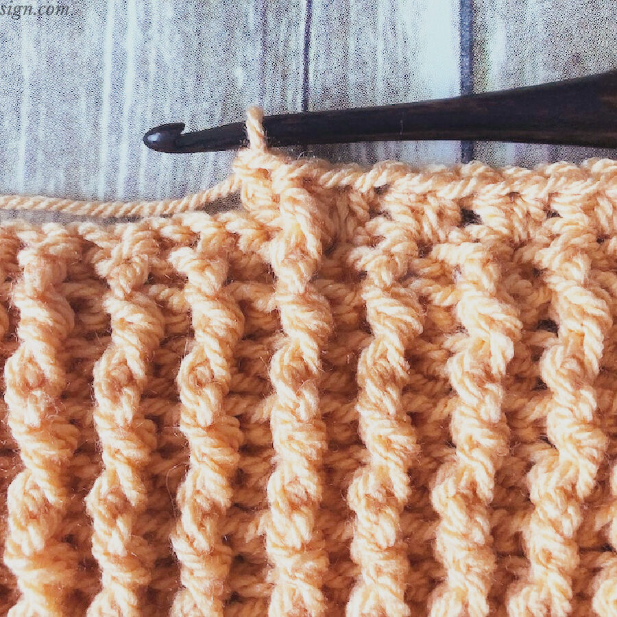 Continue post stitches for edge of blanket border.