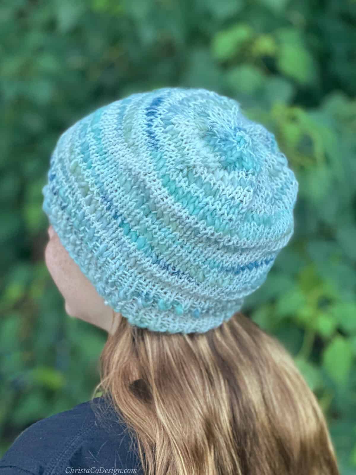 Back view of knit hat with crown shaping.