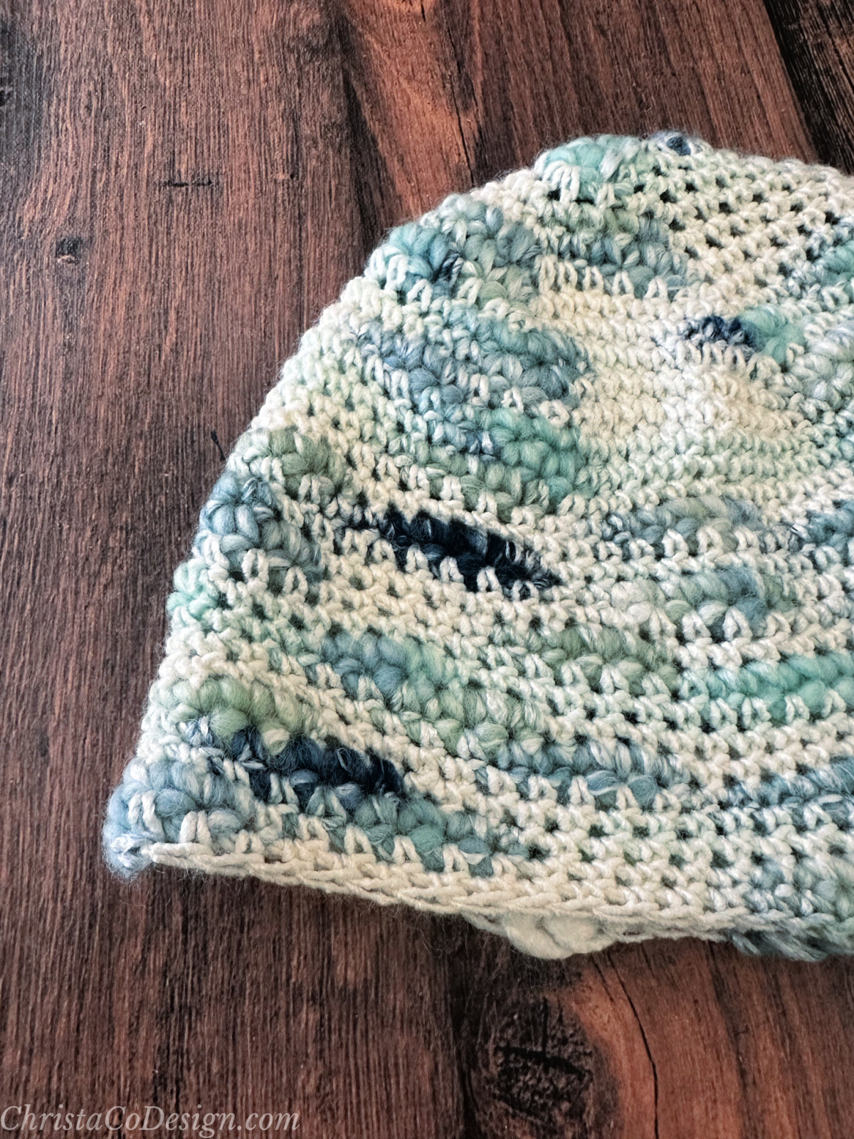 Close up of stitches in crochet hat.